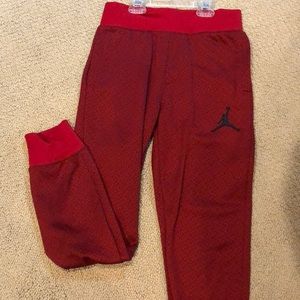 Red sweat pants